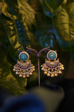 Load image into Gallery viewer, Akshara Antique Gold Tone Earrings with Blue Stone, Ruby AD Accents, Pearls &amp; Ghungroo Jhumka Drops
