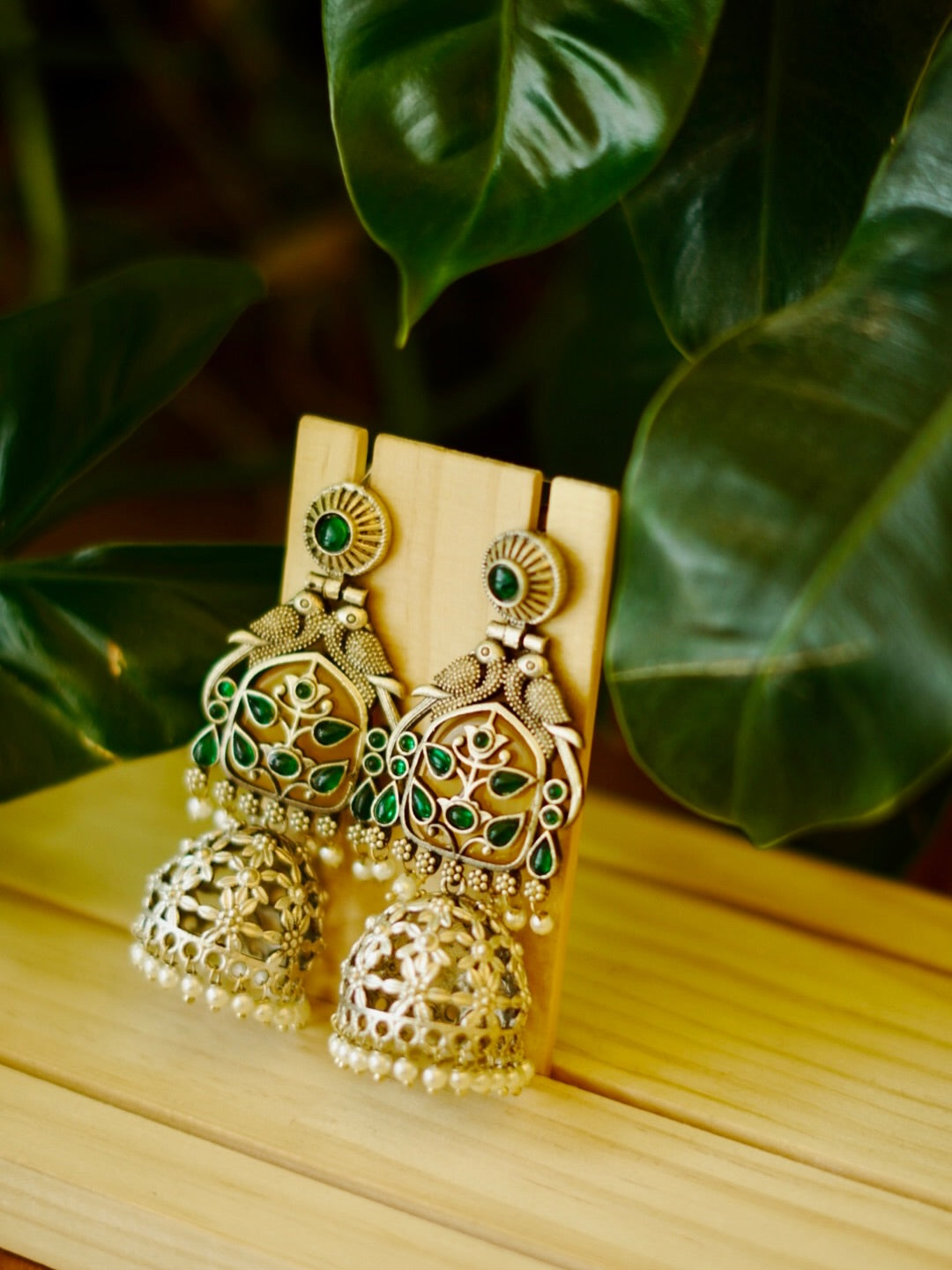 Oxidized Silver Jhumka Earrings with Green Stone Detailing