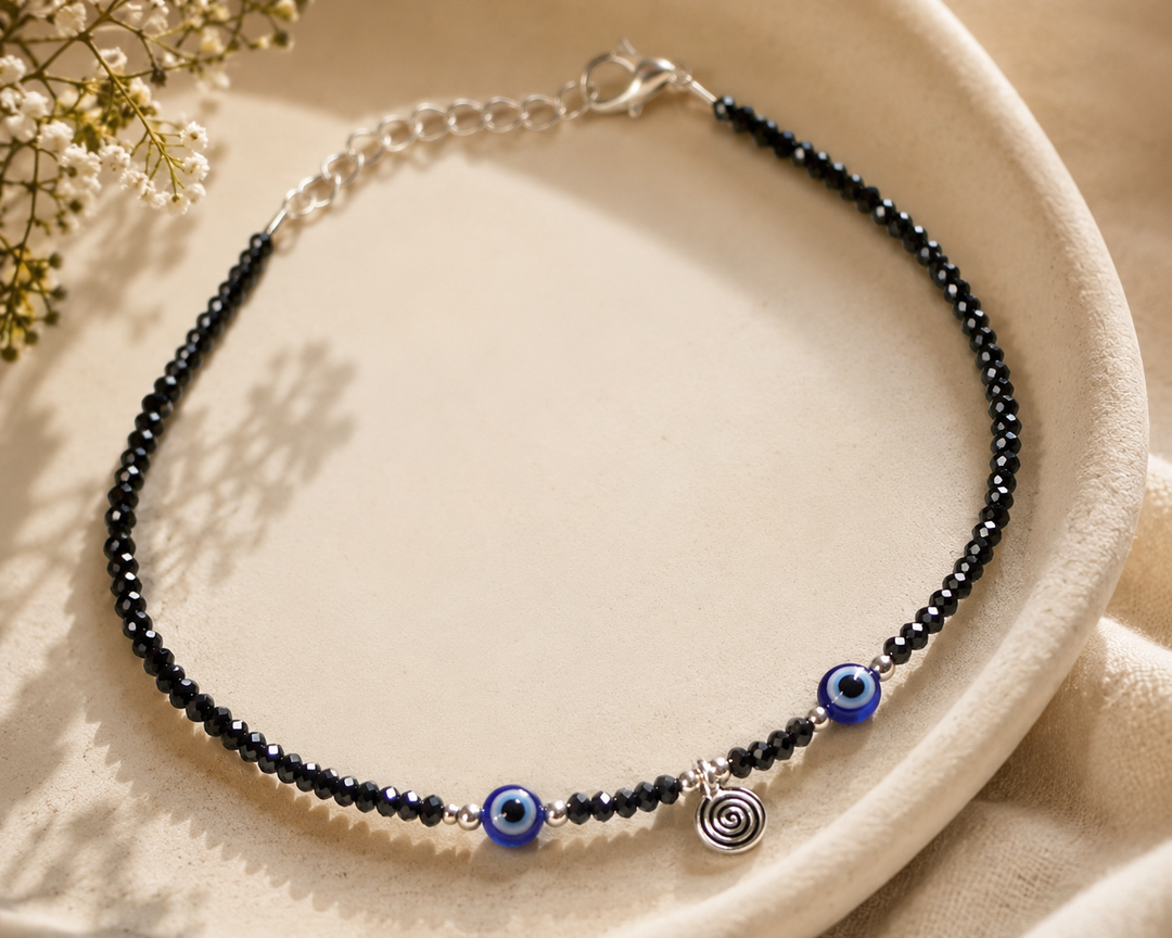 Handmade_oxidized_silver_anklet_with_faceted_black_crystal_beads_dual_blue_evil_eye_beads_spiral_silver_charmf167