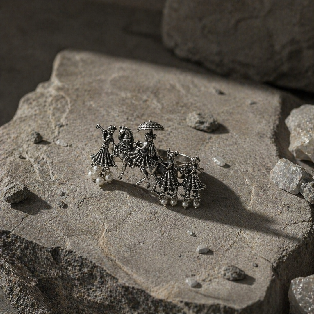 Oxidized_silver_statement_ring_with_tribal_processiona43b